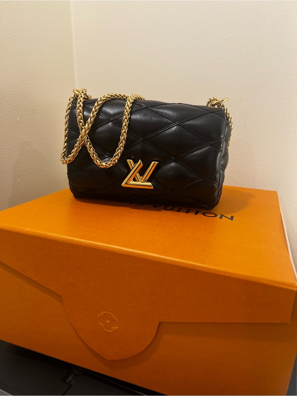 Louis Vuitton Black Quilted Shoulder Bag with Gold Hardware